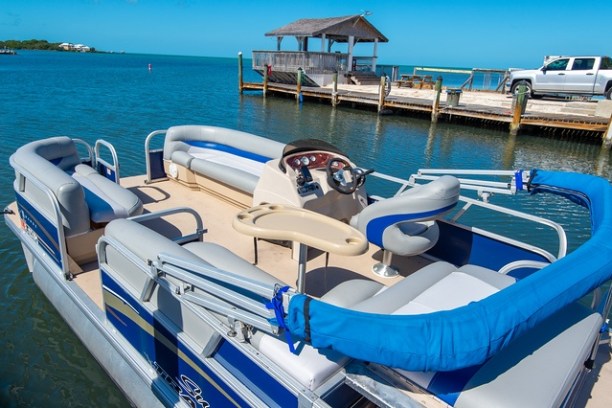 a boat that is sitting on a blue chair