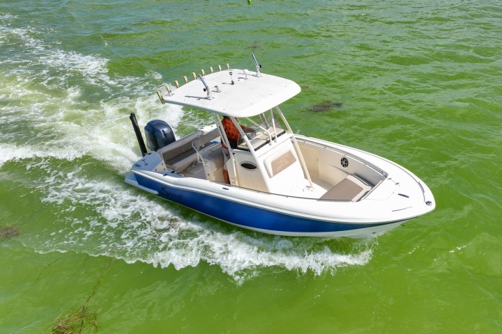 a small boat in a body of water