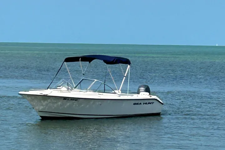 a small boat in a body of water